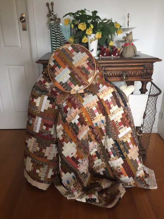 Courthouse Steps made with mid 19th century fabrics.