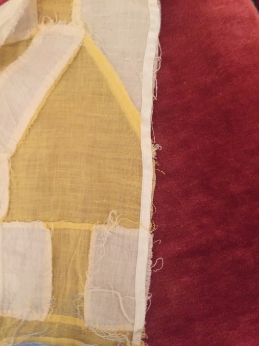 Ribbon stitched to outside edge of each block